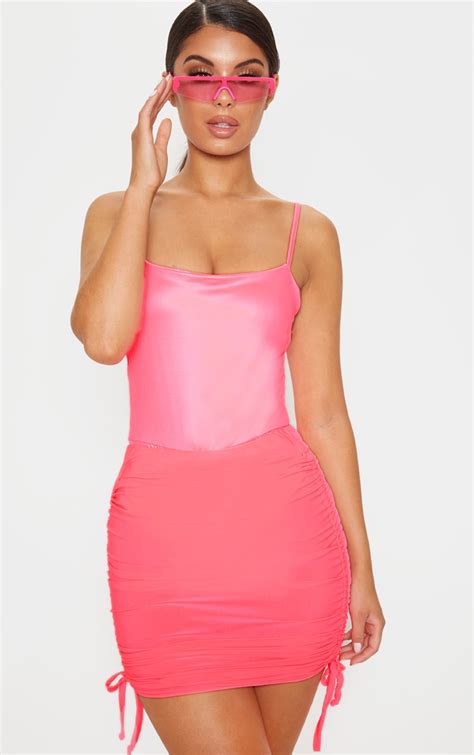 Neon Pink Scuba Strap Bodysuit Tops Prettylittlething