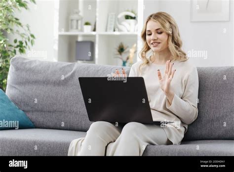 Blonde Talking And Gesturing During Video Call Stock Photo Alamy