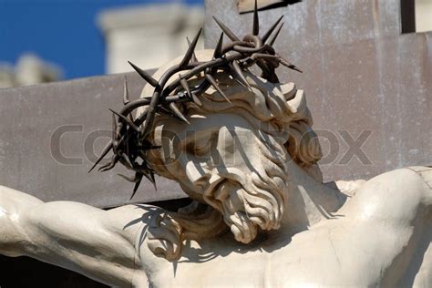 Statue of Jesus Christ at cross in ... | Stock image | Colourbox