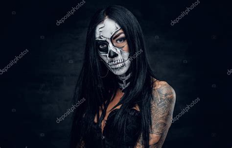 Tattooed girl with skull make up Stock Photo by ©fxquadro 127920752