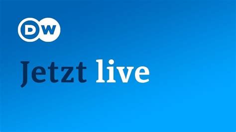 The Logo For Jetzt Live On A Blue Background