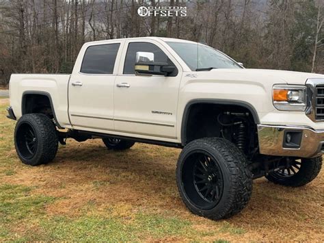 2015 Gmc Sierra 1500 With 24x14 76 Tis 547b And 37135r24 Gladiator Xcomp Xt And Suspension