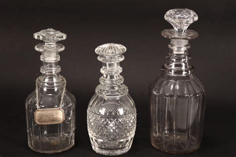 At Auction Three Georgian Ring Neck Decanters