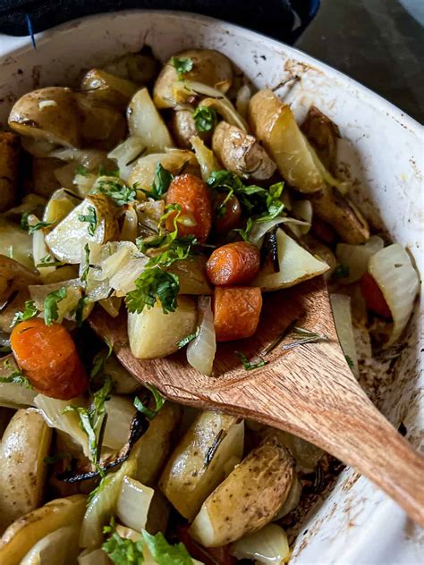 Easy Roasted Potatoes Carrots Onions In The Oven Sip Bite Go