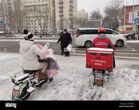 BEIJING, CHINA - DECEMBER 13, 2023 - Vehicles drive in snow in Beijing ...