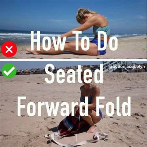 A Woman Sitting On Top Of A Surfboard In The Sand