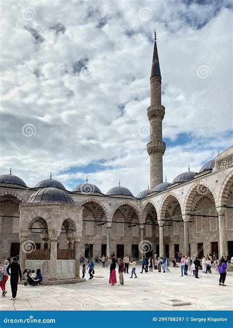 Inner Courtyard Of The Blue Mosque In Istanbul Visitors Tourists And