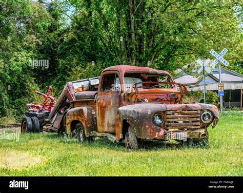 Old Rusty Truck by Railroad Crossing with trailer Stock Photo - Alamy