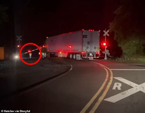 Terrifying Moment Trucker Runs For His Life Before Speeding Train