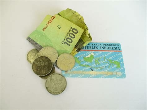 thousand rupiah coin  banknote  indonesian identity card