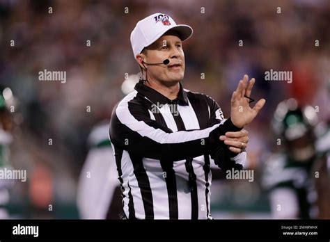 Referee Shawn Hochuli (83) makes a call during the first half of an NFL ...