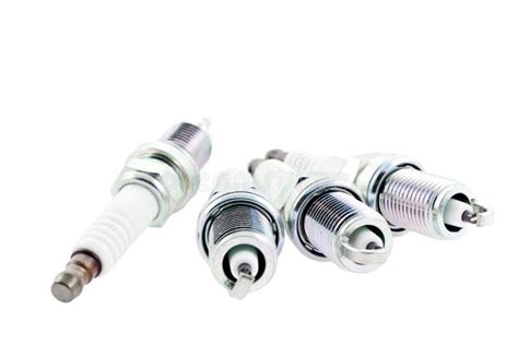 Four Spark Plugs On A White Background Stock Image - Image of background, accessories: 14786821