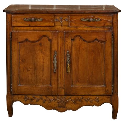 French Th Century Walnut Buffet With Carved Floral Motifs Drawers