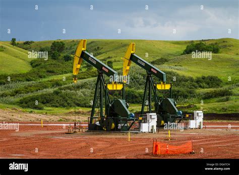 Oil Pumpers In The Bakken Play Shale Oil Fields In The Rolling Hills