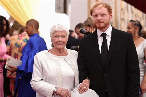 Dame Judi Dench takes her grandson (and TikTok partner) as an Oscar ...