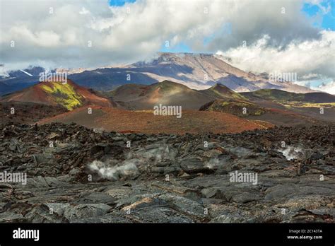 Lava Field At Tolbachik Volcano After Eruption In On Background