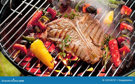 Beef T Bone Steaks On The Grill With Flames Stock Image Image Of