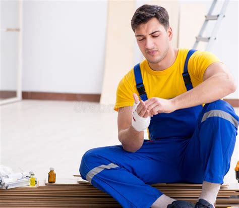 Worker With Injured Hand At Construction Site Stock Photo Image Of