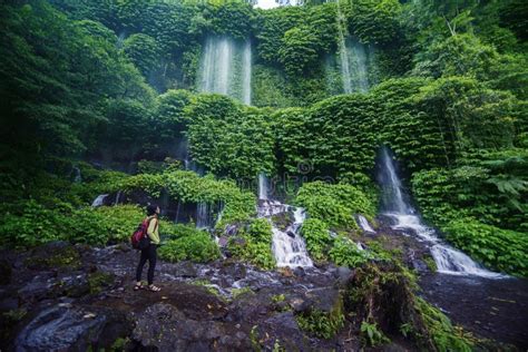 Tourist Enjoys a Beautiful of Kelambu Waterfall Stock Image - Image of ...