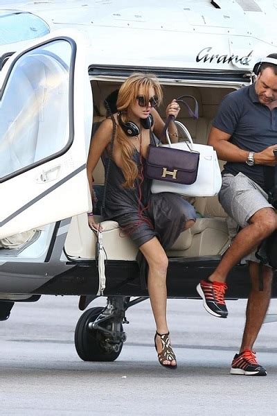 Welcome To Oghenemaga Otewu S Blog Lindsay Lohan Suffers Wardrobe Malfunction Exposes Her Boob