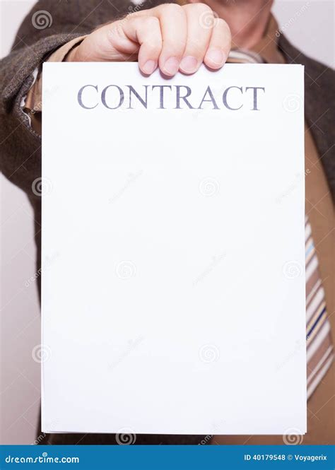 Businessman Holding Blank Paper With Sign Contract Stock Photo - Image: 40179548