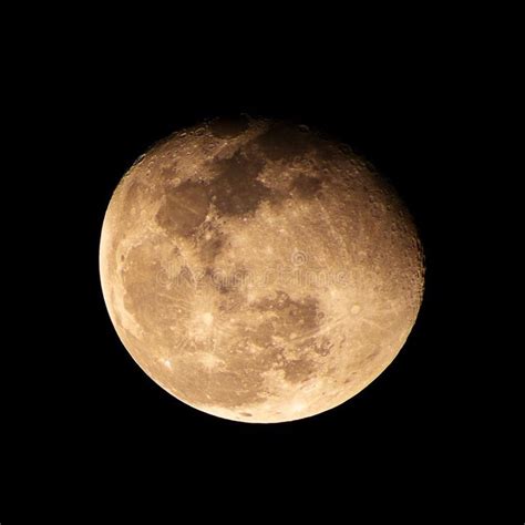 Close Up Of Warning Gibbous Moon Phase From Earth On Dark Black Sky