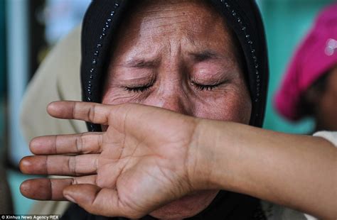 Indonesian Mudslide Death Toll Rises To 56 As Search For Dozens Still