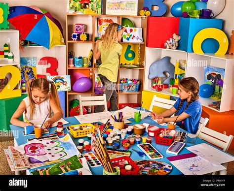 children painting  drawing  craft lesson  primary school