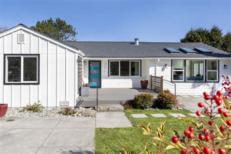 Attached Garage Conversion with Farmhouse Exterior