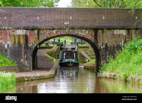 Canal Narrowboat Passing Under Bridge No On The Shropshire Union