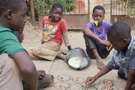 Children Play Traditional Game At Food Center In Zimbabwe