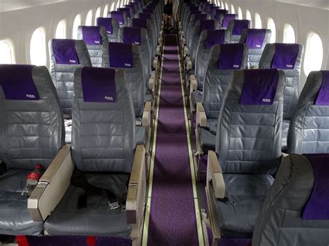 FLYBE Dash 8 cabin | Airplane interior, Aircraft interiors, Interior