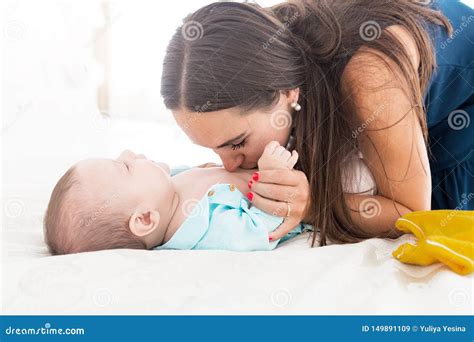 Mom Kisses Her Baby In The Small Belly Stock Image Image Of Belly