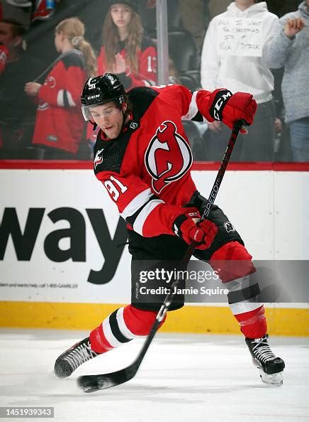 Dawson Mercer of the New Jersey Devils shoots during warm-up prior to ...