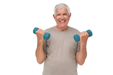 Retrato De Un Hombre Mayor Feliz Que Ejercita Con Pesas De Gimnasia