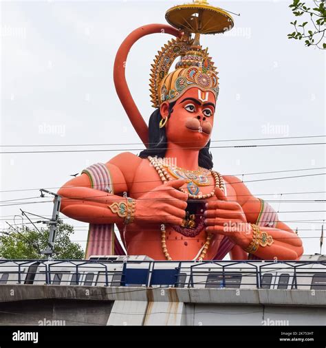 Big statue of Lord Hanuman near the delhi metro bridge situated near ...