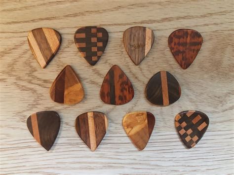 [GEAR] My Dad has been making me wood guitar picks for the last few years and I thought you guys ...