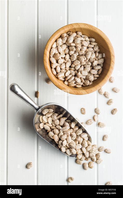 Dried Borlotti Beans In Wooden Bowl Stock Photo Alamy