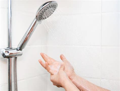 Premium Photo Woman Washing Hands With Soap In Shower