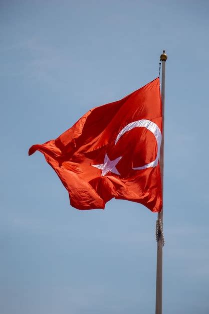 Premium Photo Turkish National Flag With White Star And Moon In Sky