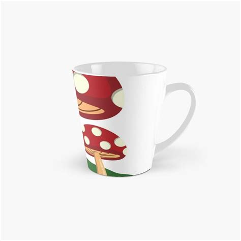 A Tall Mug With Mushrooms On It