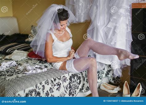 Morning Preparations Of Bride In Underwear Before The Wedding Stock