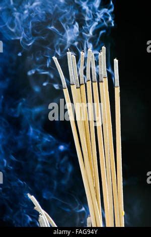 Incense Sticks On Joss Stick Pot Burning And Smoke Taoist Temple