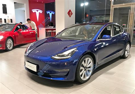 国产版特斯拉model 3降价 补贴后售价约299万元 每经网