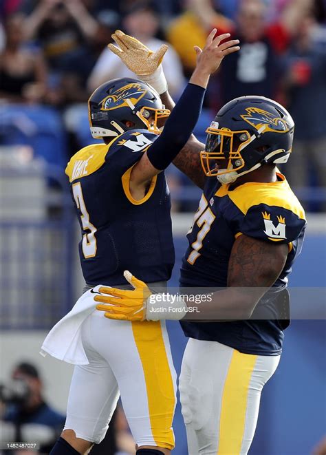 Quarterback Brady White Of The Memphis Showboats Celebrates With