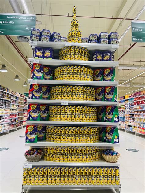 A Large Display In A Grocery Store Filled With Lots Of Yellow And Blue