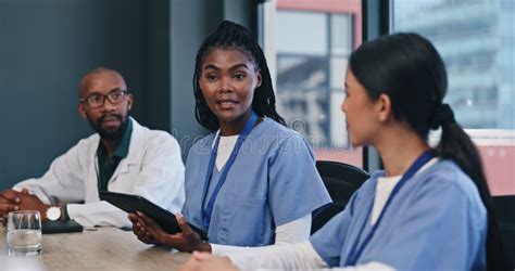 Teamwork Tablet Or Nurses In Meeting For Research Planning Or Talking In Collaboration In