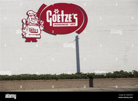 A Logo Sign Outside Of The Headquarters And Factory Of The Goetzes