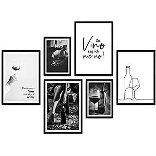 A Black And White Photo With Wine Bottles On It S Side Framed In