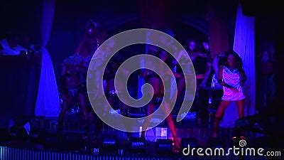 Go Go Dancer In Bikini On Pole On Stage Of Nightclub Slow Motion Strip Plasty Stock Video